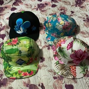 Floral print and Mickey Mouse graffiti snapbacks
